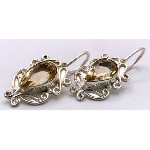 2898 - A Pair of Citrine, 925 Sterling Silver Drop Earrings. 9ctw. Drop - 2.5cm. Comes with a presentation ... 