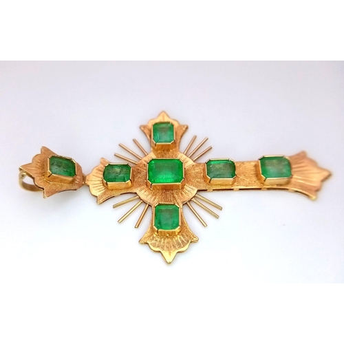 1280 - A Vintage 18K Yellow Gold and Emerald Cross. 1.2ctw of rich green emeralds decorate this holy symbol... 