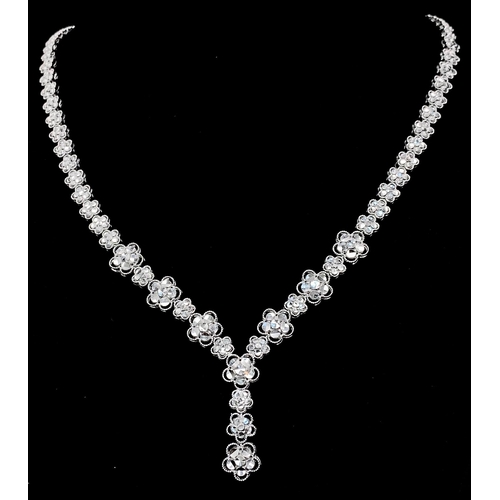 2899 - A Glorious 18K White Gold, Diamond Cut Necklace, Bracelet and Earring Set. Necklace - Graduated diam... 