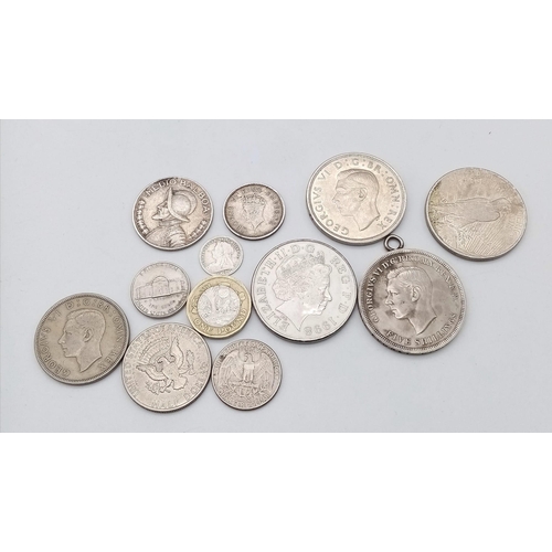 2896 - A collection of 11 interesting coins.
Quite a mix, see photos for details, some silver.
Total weight... 