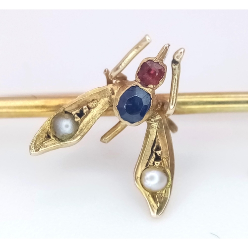 2897 - An Antique Victorian High-Karat Gold Fly Brooch. Sapphire and ruby body with pearl wings. 3.5cm. 1.1... 