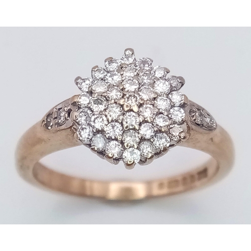 2900 - A Petite 9K Yellow Gold 0.25CT Diamond Encrusted Ring. Over 50 small round cut diamonds in a pave se... 