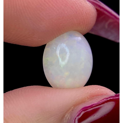 581 - A Parcel of Natural Stones, consisting of one Natural White Fire Opal and one Natural Opal.
Both Sle... 