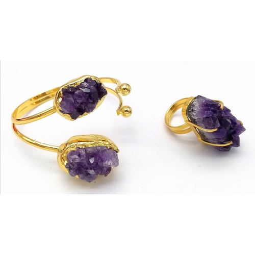 110 - A uniquely created, heavily gilded, bangle and ring set with a large natural bouquet of amethyst cry... 