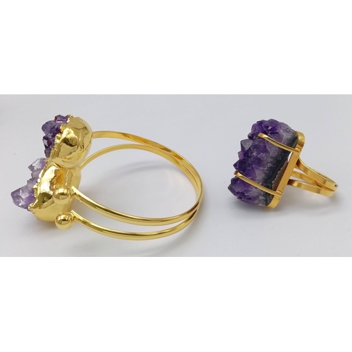 110 - A uniquely created, heavily gilded, bangle and ring set with a large natural bouquet of amethyst cry... 