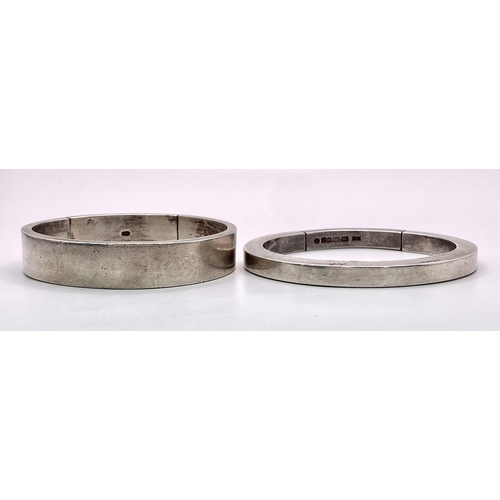 1131 - Two Vintage Heavy 925 Silver Clip-Open Bangles. London hallmarks. 145.6g total weight.