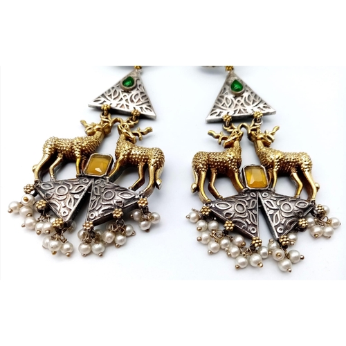 1140 - A Pair of Elaborate Gilded Reindeer Drop Earrings. Set amongst green and white stones on 925 silver.... 