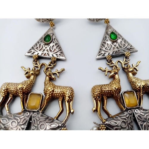 1140 - A Pair of Elaborate Gilded Reindeer Drop Earrings. Set amongst green and white stones on 925 silver.... 