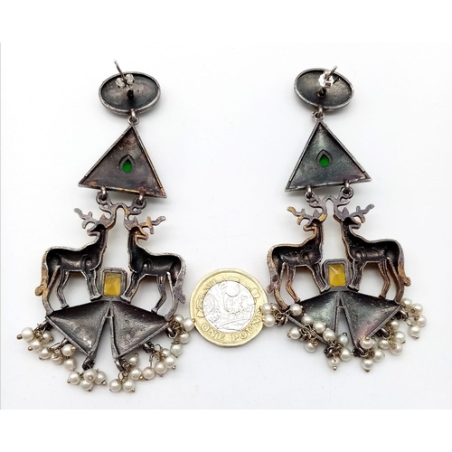 1140 - A Pair of Elaborate Gilded Reindeer Drop Earrings. Set amongst green and white stones on 925 silver.... 