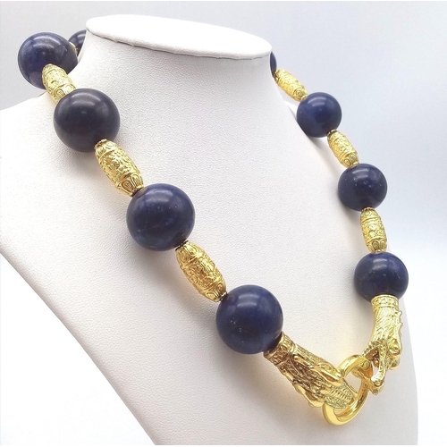 117 - A majestic lapis lazuli and gold-filled Chinese dragons necklace and earrings set in a presentation ... 