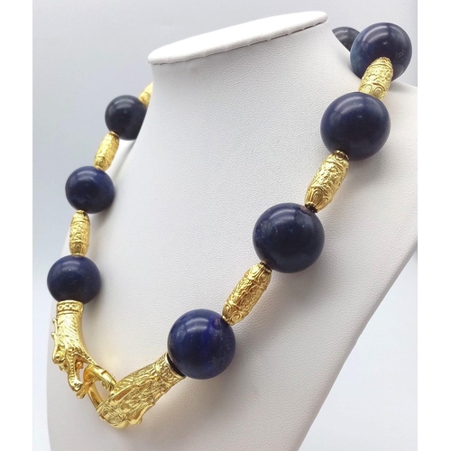 117 - A majestic lapis lazuli and gold-filled Chinese dragons necklace and earrings set in a presentation ... 