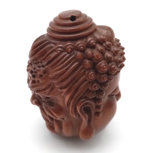 138 - A Buddhist, Japanese, cedar wood, netsuke with the two faces of life, Good and Evil. Dimensions: 60 ... 