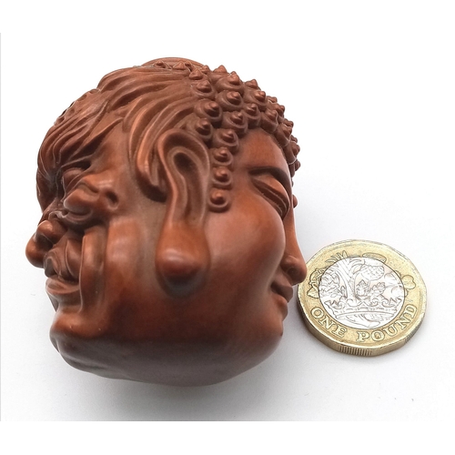 138 - A Buddhist, Japanese, cedar wood, netsuke with the two faces of life, Good and Evil. Dimensions: 60 ... 