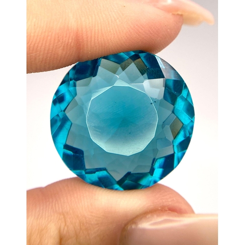 19 - A spectacular large (55.5 carats) vivid teal coloured GRANDIDIERITE, round cut with excellent colour... 