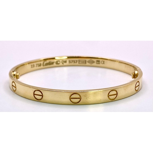 3 - A 18K YELLOW GOLD CARTIER STYLE BANGLE 35.8G 20.2cm

(7995)