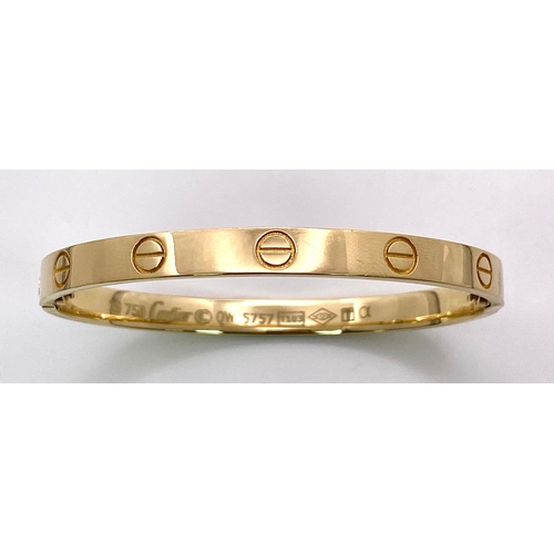 3 - A 18K YELLOW GOLD CARTIER STYLE BANGLE 35.8G 20.2cm

(7995)