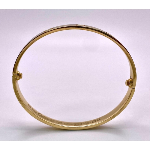 3 - A 18K YELLOW GOLD CARTIER STYLE BANGLE 35.8G 20.2cm

(7995)