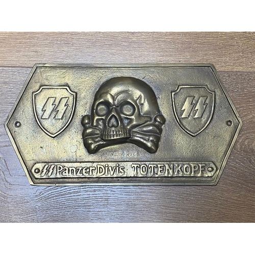 309 - A German WW2 Panzer Division Totenkopf Brass Plaque - with the death head and SS runes either side. ... 