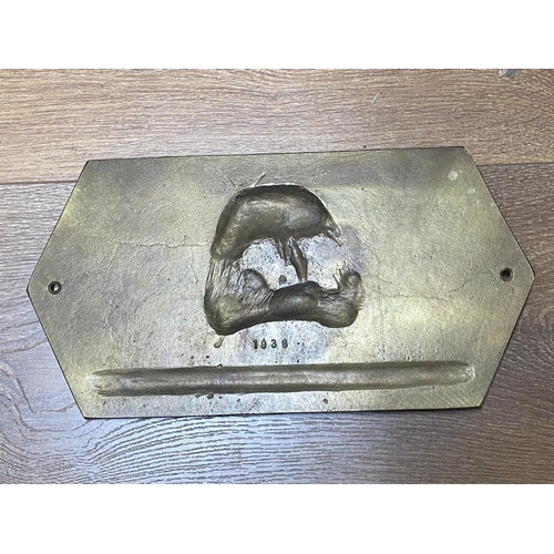 309 - A German WW2 Panzer Division Totenkopf Brass Plaque - with the death head and SS runes either side. ... 