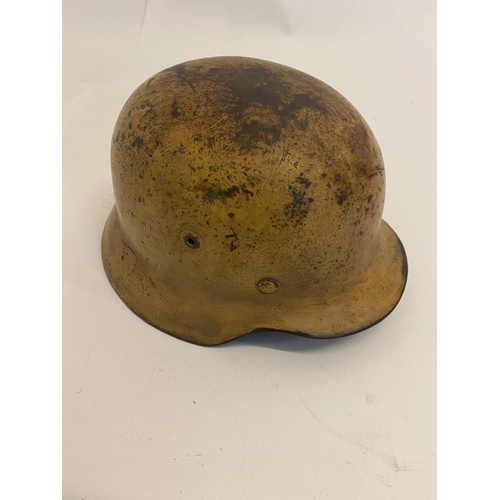 369 - A WW2 German Tropical M40 Helmet with Original Liner - Dated 1937. Markings of ET64 and it appears t... 