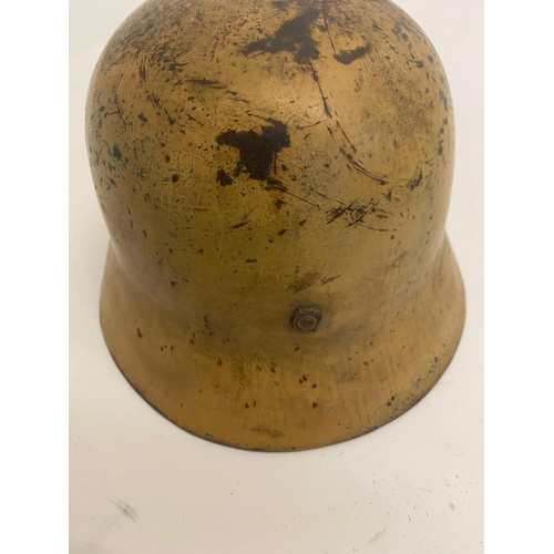 369 - A WW2 German Tropical M40 Helmet with Original Liner - Dated 1937. Markings of ET64 and it appears t... 