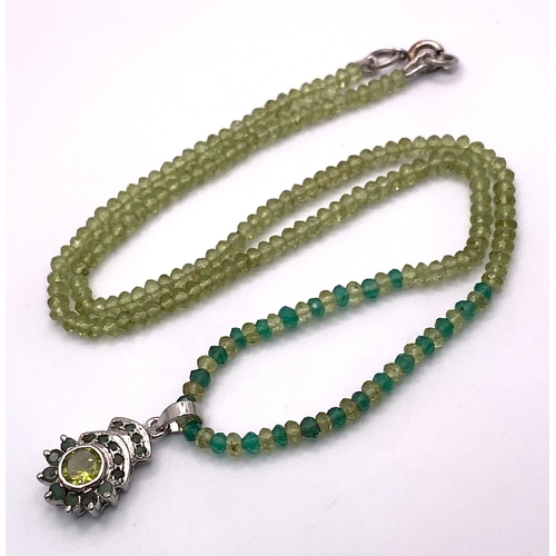 392 - A Peridot & Green Onyx Beaded Necklace with Pendant drop Plus a Pair of Peridot Earrings.  Set in 92... 