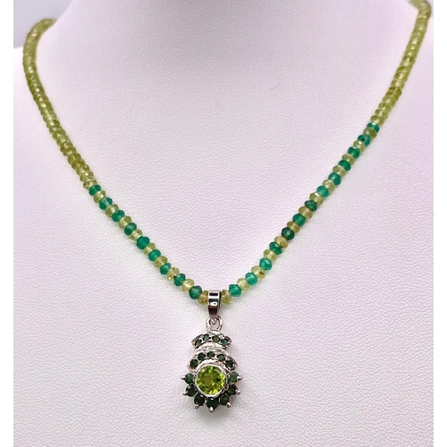 392 - A Peridot & Green Onyx Beaded Necklace with Pendant drop Plus a Pair of Peridot Earrings.  Set in 92... 