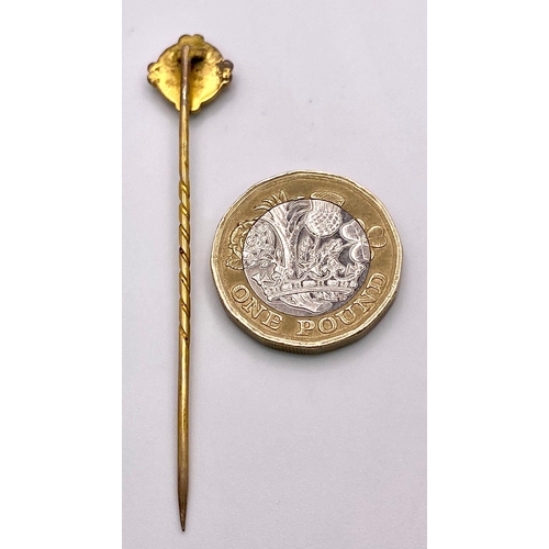 424 - An Antique Mid-Karat Gold and Diamond Stick-Pin. 6.5cm. Comes with its original French case. 1.52g t... 