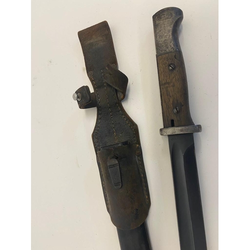 541 - A German WW2 K98 Bayonet and Scabbard with Frog. The bayonet is dated 1938 with the serial number 78... 