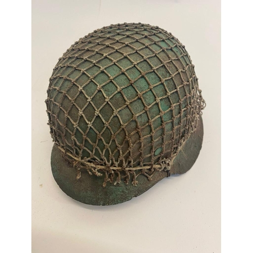 590 - A Rare German WW2 M42 Camo Helmet with Strapping. The chin strap and liner are intact. ML596