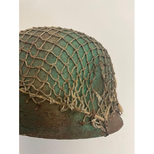 590 - A Rare German WW2 M42 Camo Helmet with Strapping. The chin strap and liner are intact. ML596