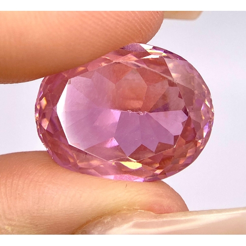 61 - A large (41.8 carats), oval cut, pink KUNZITE, excellent quality, flawless in every aspect, dimensio... 