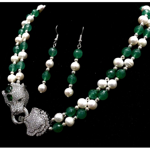 82 - A show stopping, in the style of French designers, green jade and natural white pearl necklace and e... 