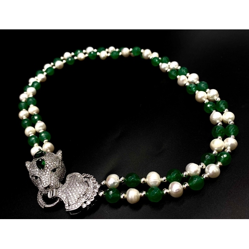 82 - A show stopping, in the style of French designers, green jade and natural white pearl necklace and e... 