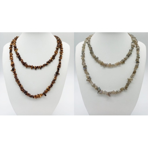 1135 - A parcel of Two Vintage Long Natural Stone Necklaces.
Both measure 90cm in length. The white necklac... 