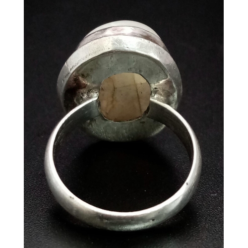 841 - A vintage silver smoky quartz ring. Total weight 9.44 grams. Size P