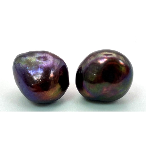 849 - A Pair of Cultured Black Pearl Stud Earrings.