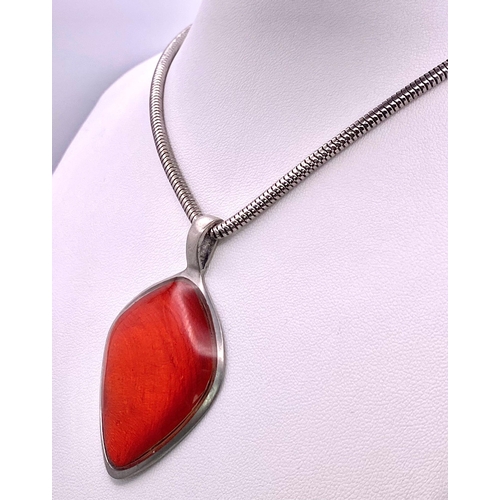 855 - Large Iridescent Orange Stone Pendant Necklace.
Pendant looks amazing in the light and measures 5cm ... 