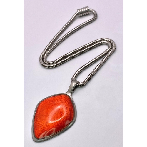 855 - Large Iridescent Orange Stone Pendant Necklace.
Pendant looks amazing in the light and measures 5cm ... 