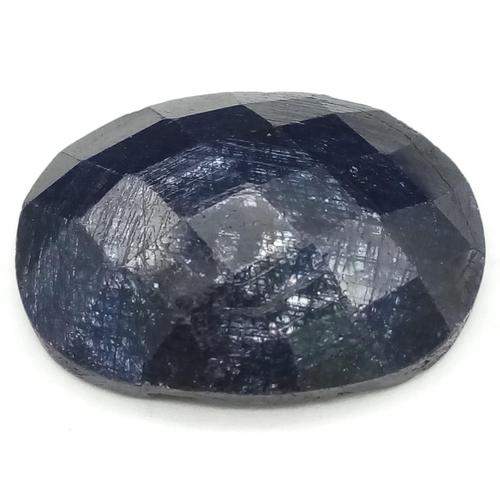 1108 - A 36.7ct Deep Blue Natural Corundum Gemstone. Comes with a WGI certificate.