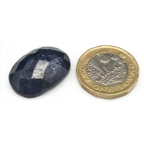 1108 - A 36.7ct Deep Blue Natural Corundum Gemstone. Comes with a WGI certificate.