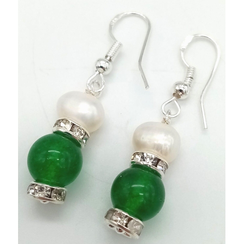 856 - A Pair of Jade and Cultured Pearl Earrings.