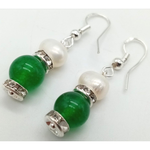 856 - A Pair of Jade and Cultured Pearl Earrings.