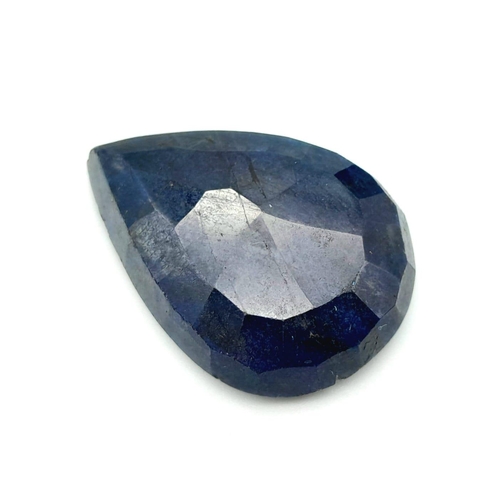 1110 - A 100.95 Ct Faceted Enhanced Blue Sapphire in Pear Shape. GLI Certified.