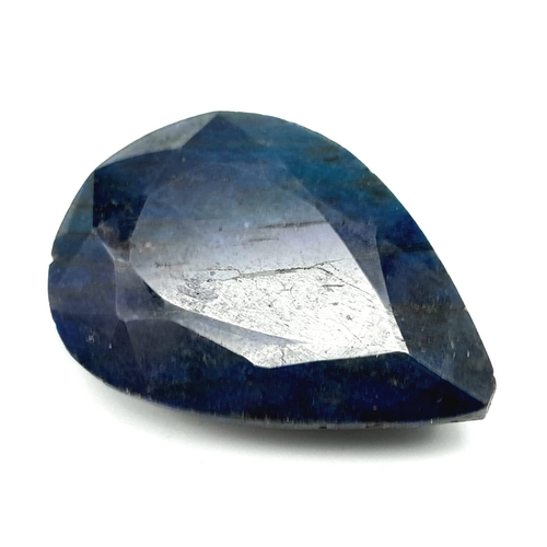 1110 - A 100.95 Ct Faceted Enhanced Blue Sapphire in Pear Shape. GLI Certified.