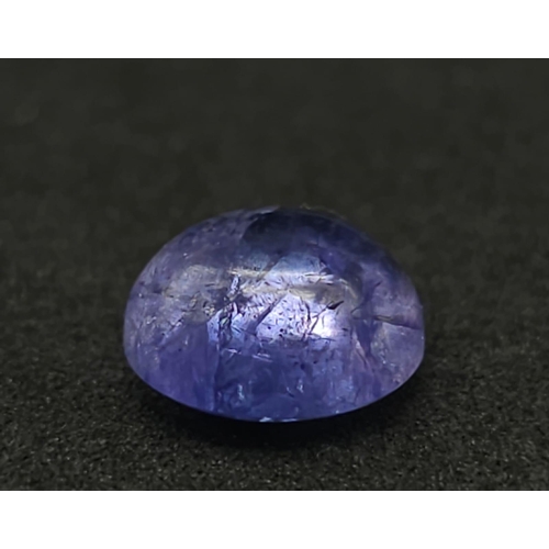 806 - 5.100 Ct, Rounded Cabochon cut Blue NATURAL TANZANITE with GLI Identification Card.
Size: 10.00mmx10... 