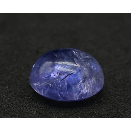 806 - 5.100 Ct, Rounded Cabochon cut Blue NATURAL TANZANITE with GLI Identification Card.
Size: 10.00mmx10... 