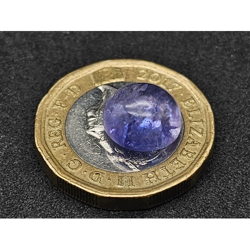 806 - 5.100 Ct, Rounded Cabochon cut Blue NATURAL TANZANITE with GLI Identification Card.
Size: 10.00mmx10... 