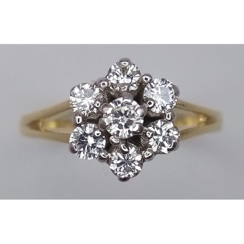 10 - A 18K YELLOW GOLD DIAMOND CLUSTER RING 0.70CT 3.2G SIZE O

(7680)