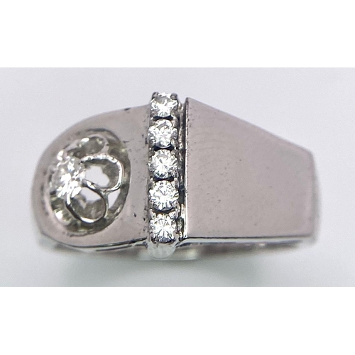 101 - A STERLING SILVER DIAMOND SET RING 0.20CT 5.3G SIZE P 1/2

(7912)